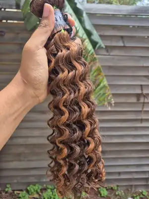 Colored Peruvian deep curl weave