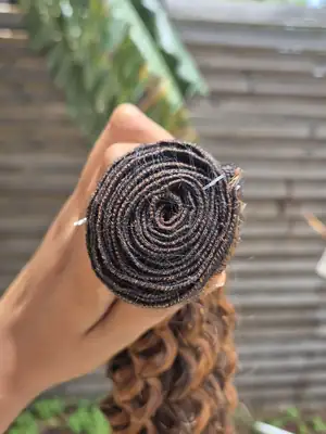 Colored Peruvian deep curl weave 4