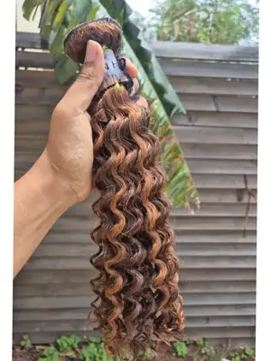 Colored Peruvian deep curl weave