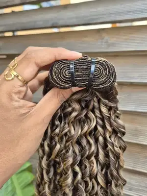 Dark brown pixel curl weave with blonde highlights 3